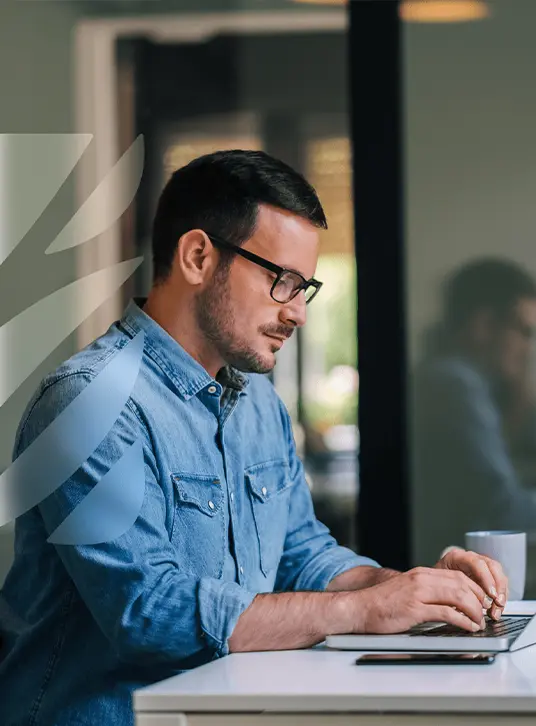 Man working infront of laptop